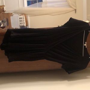 Black romper with ruffle detailing